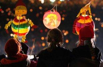 Three kids with lanterns